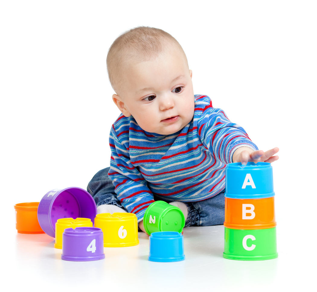 baby playing with educational toys